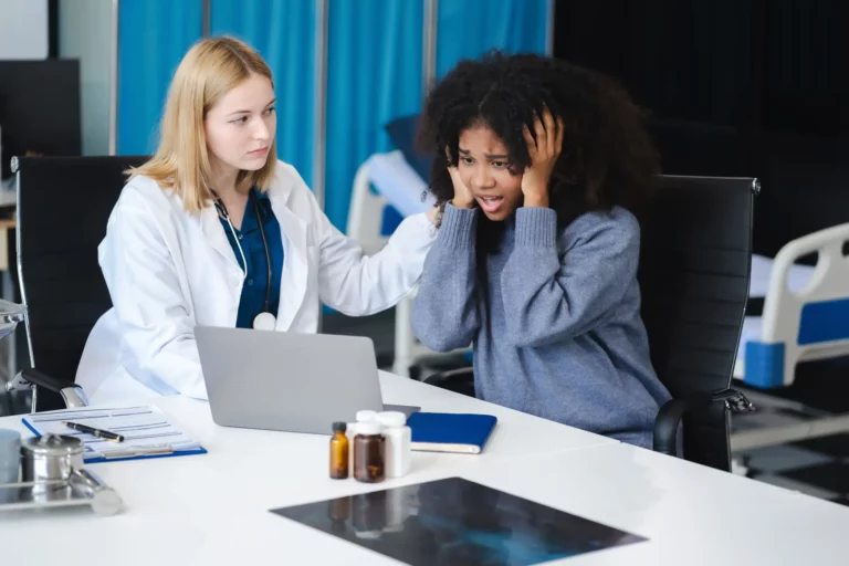 female doctor consulting patient