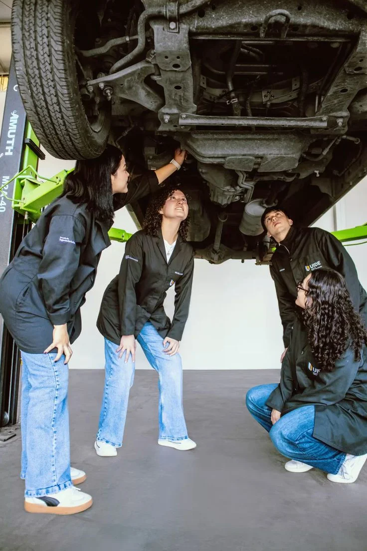 mechanics fixing a car